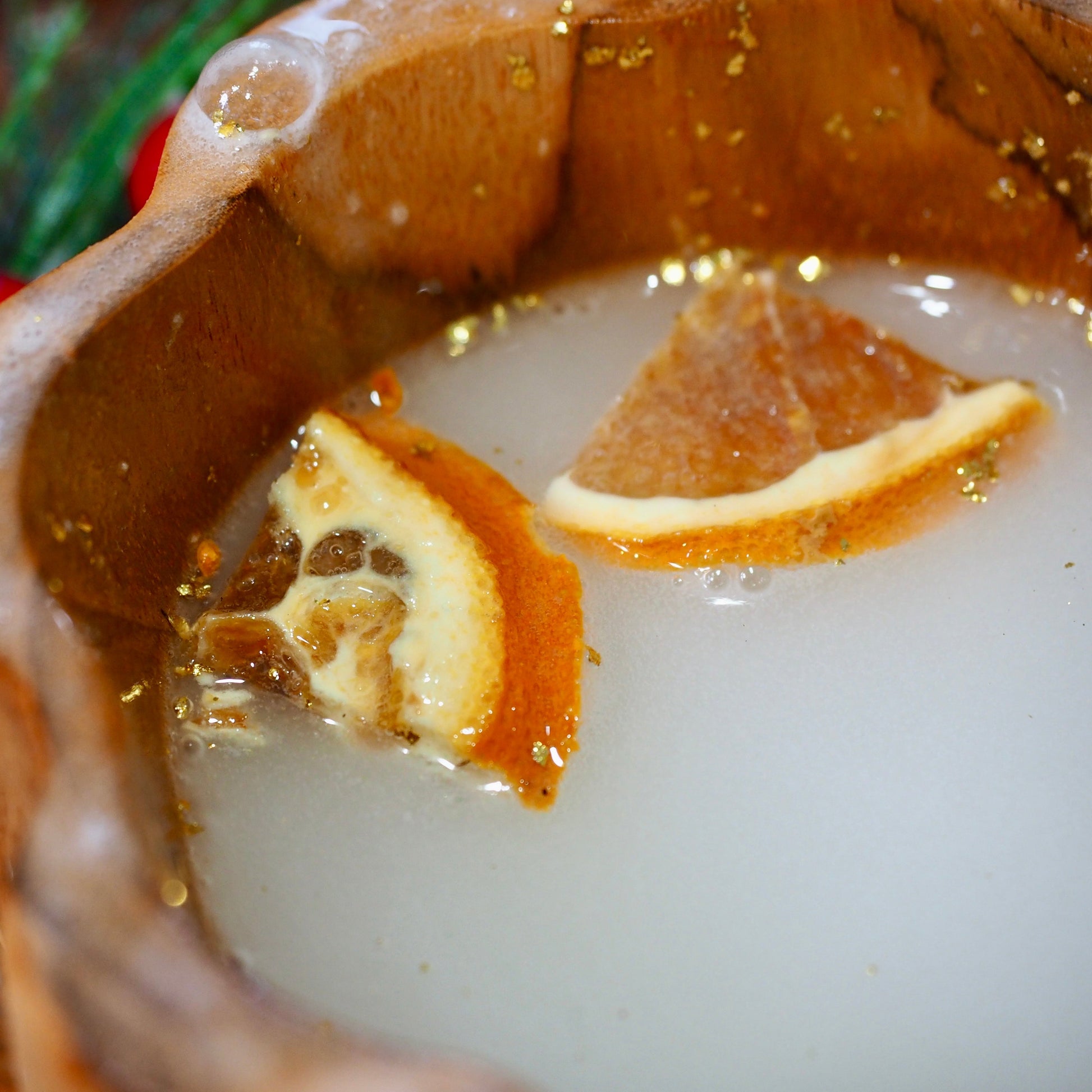 Barefoot Potions - Citrus Rocks - Citrus floating in a Bowel after all the bubbles have gone away.