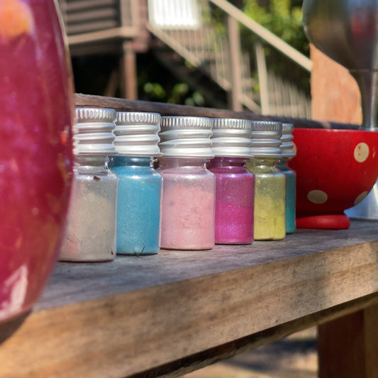 Colourful jars of Barefoot Potions Shimmer Dust 6 Pack